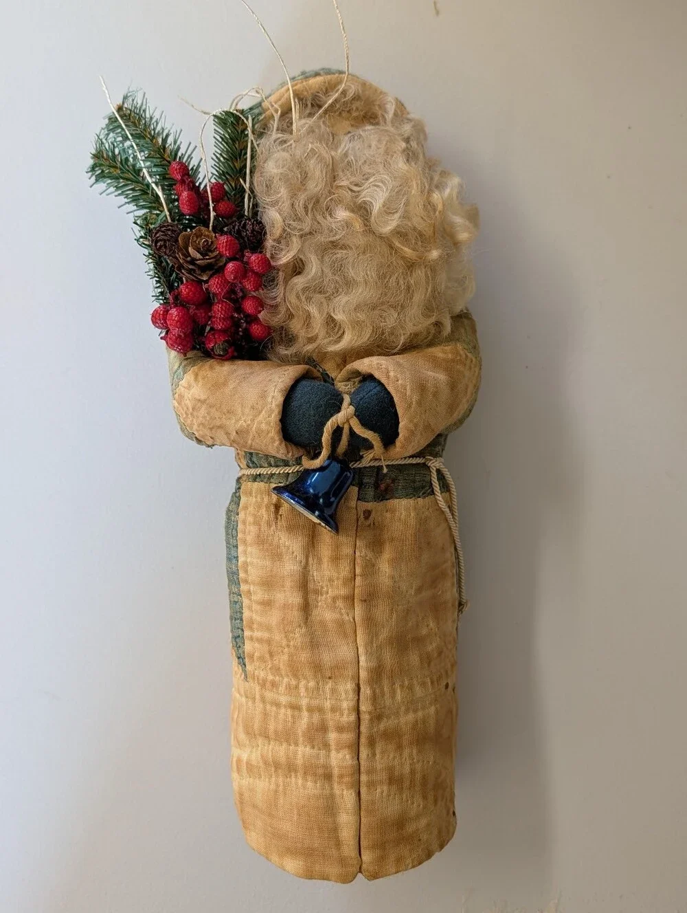 FOLK ART SANTA CLAUS wearing an antique quilt